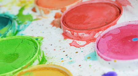Colourful paints in pots